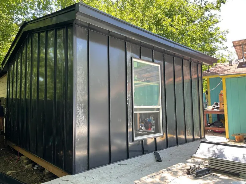 Black standing seam metal wall panels for Metal Roof Installation in Greenwich